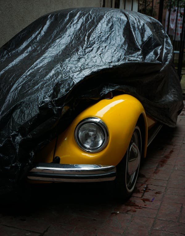 Abri voiture bâche : la protection sur mesure pour votre auto